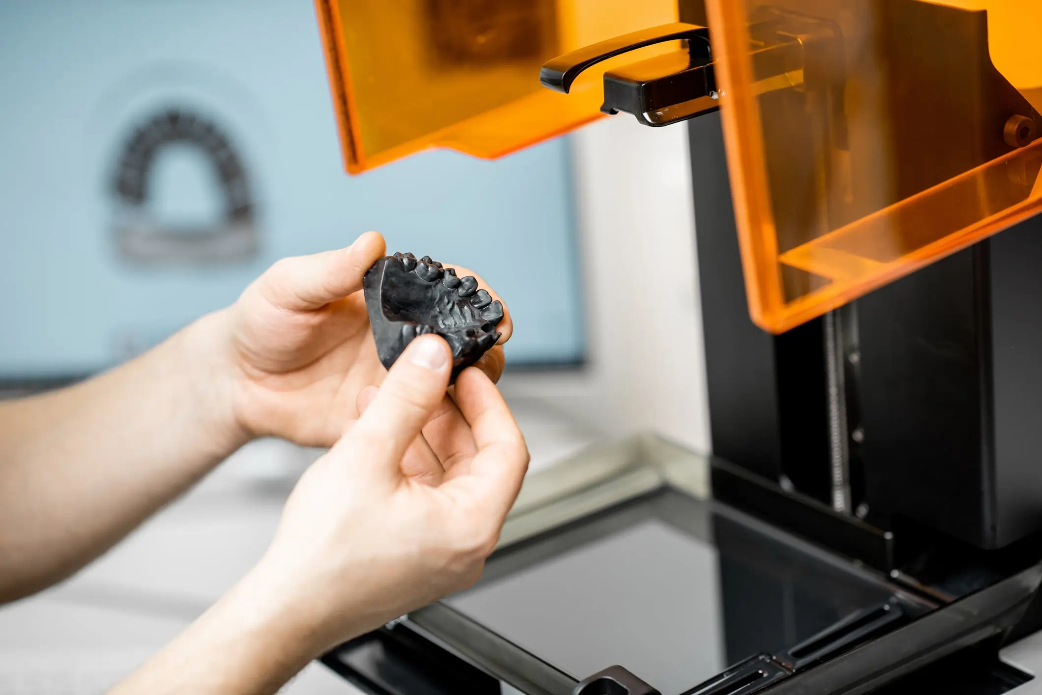 Dental model made with SLA 3D printer using resin and UV light technology