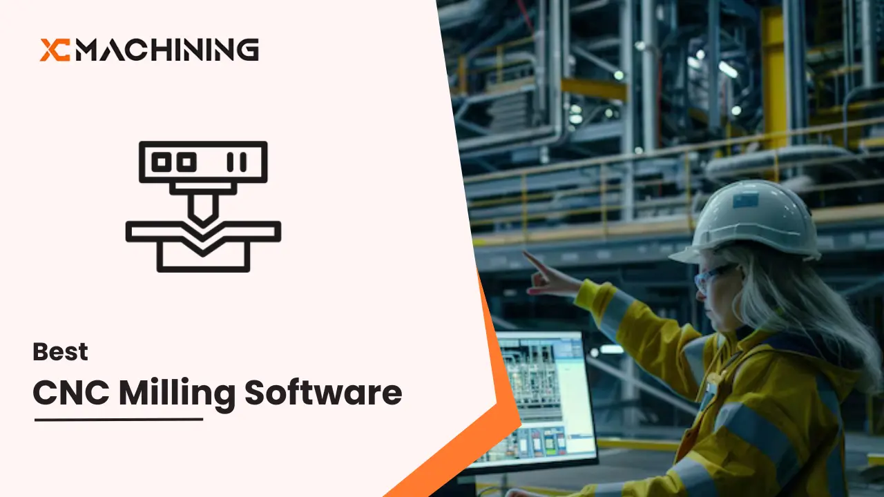 Engineer in hard hat and safety gear operating a computer with CNC milling software in a factory