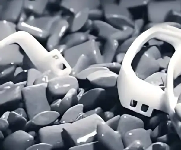 Vapor smoothing process enhancing surface quality of white MJF printed plastic components.